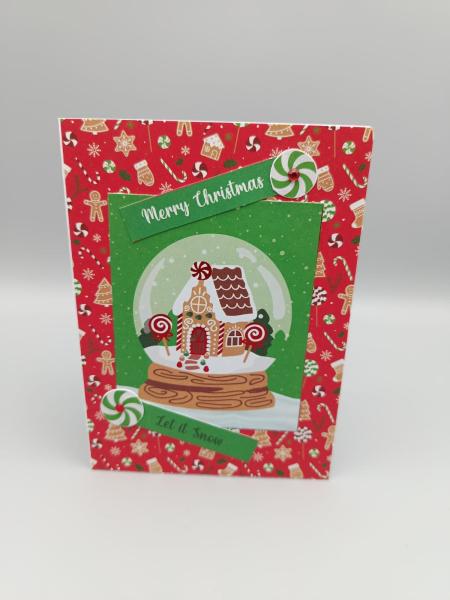 Weihnachtskarte "Zuckerstangen‑Schneekugel"